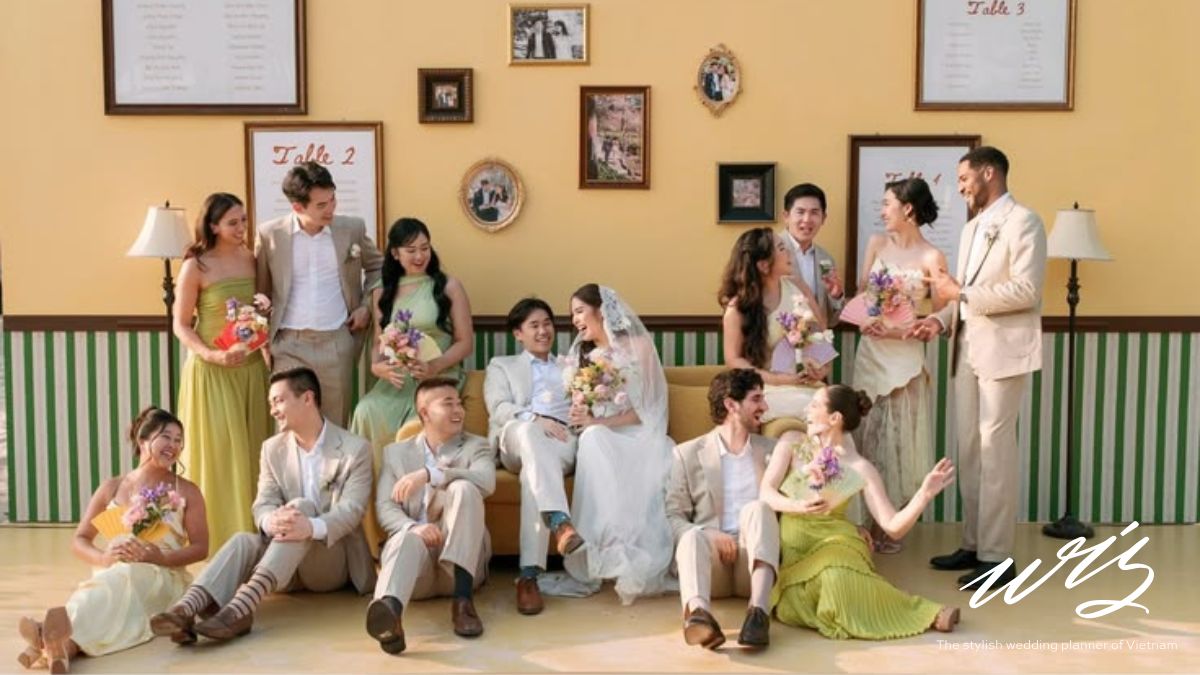 Bride and groom with wedding party at a destination wedding, highlighting guest-related wedding costs