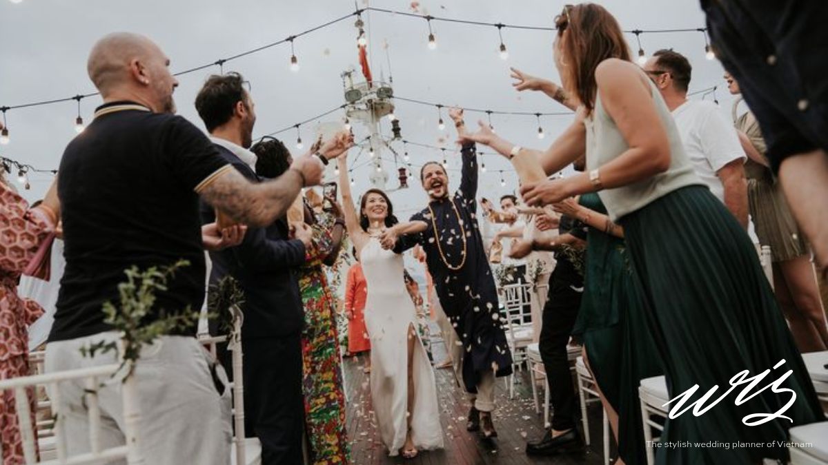 Guests celebrating with the newlyweds at a destination wedding